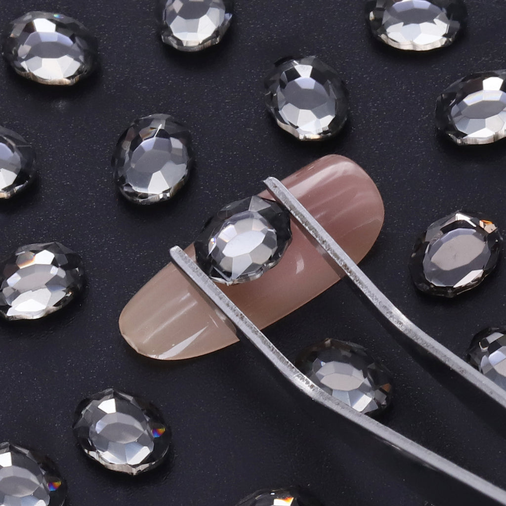 ヘマタイトの魔法の鏡の形は、ネイルアートのための派手なラインストーンを尖らせた