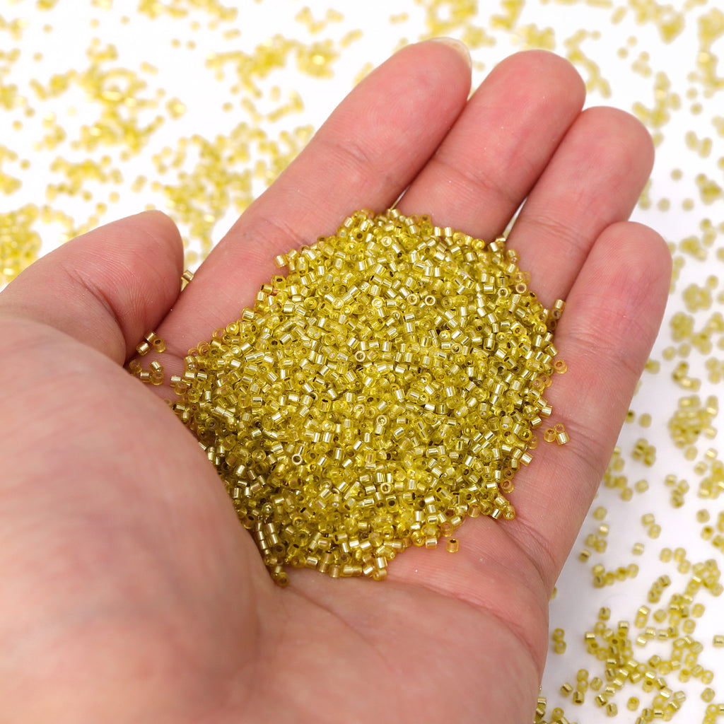 Transparent Silver-lined Light Yellow Color Hight Quality Glass Cylinder Seed Beads 1.6 MM Size GY2004 WholesaleRhinestone