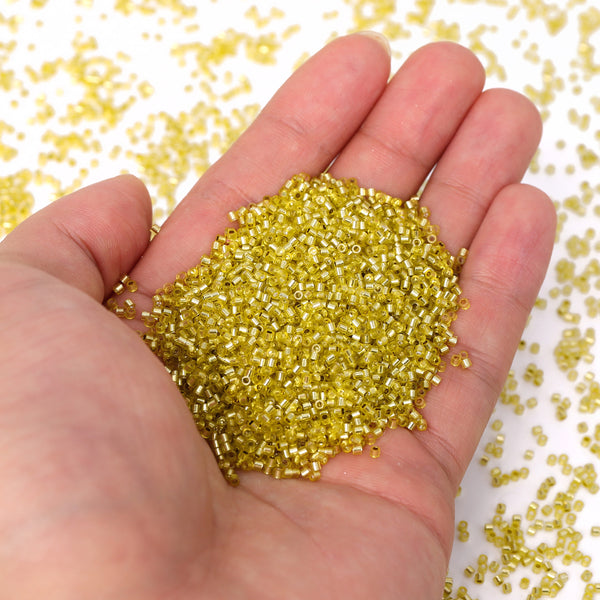 Transparent Silver-lined Light Yellow Color Hight Quality Glass Cylinder Seed Beads 1.6 MM Size GY2004 WholesaleRhinestone